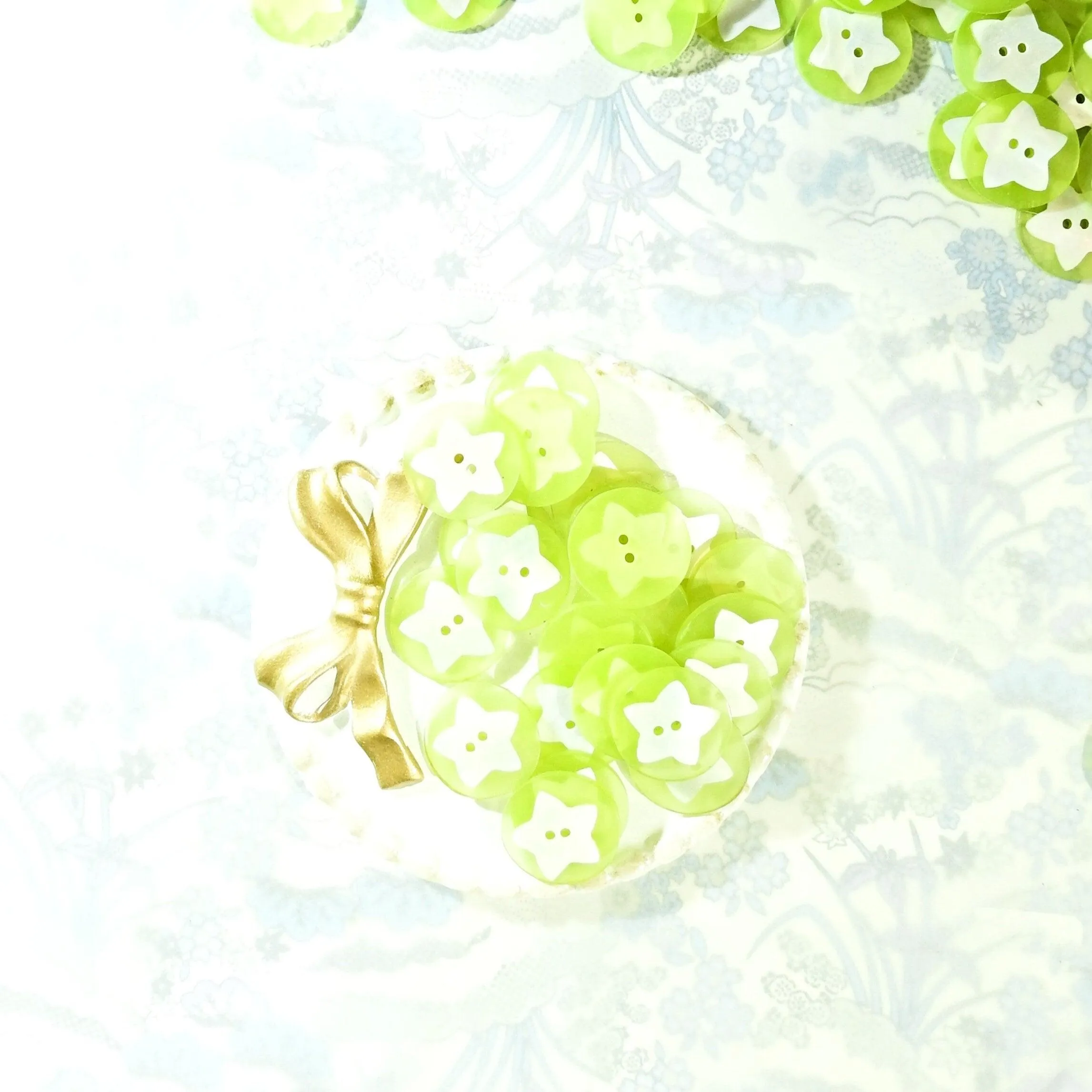 Green beach themed buttons with stars