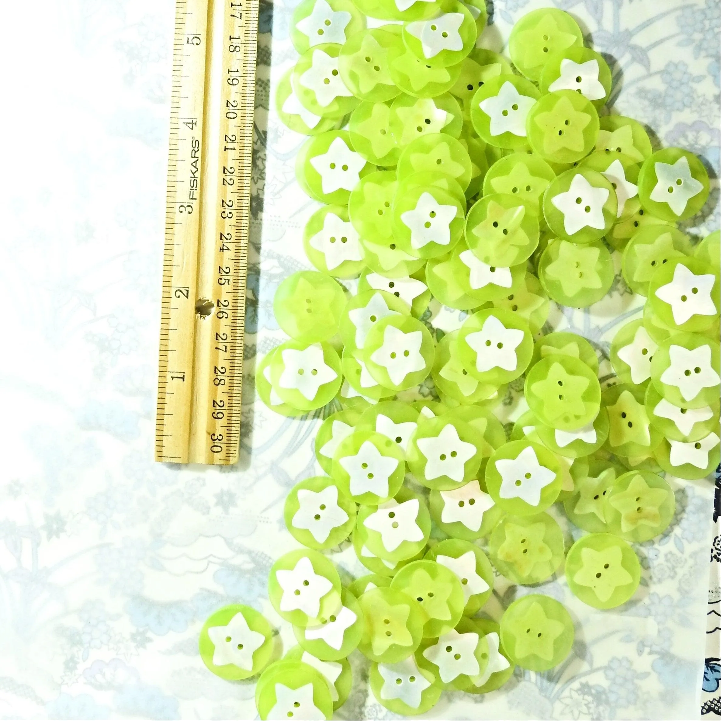 Green beach themed buttons with stars