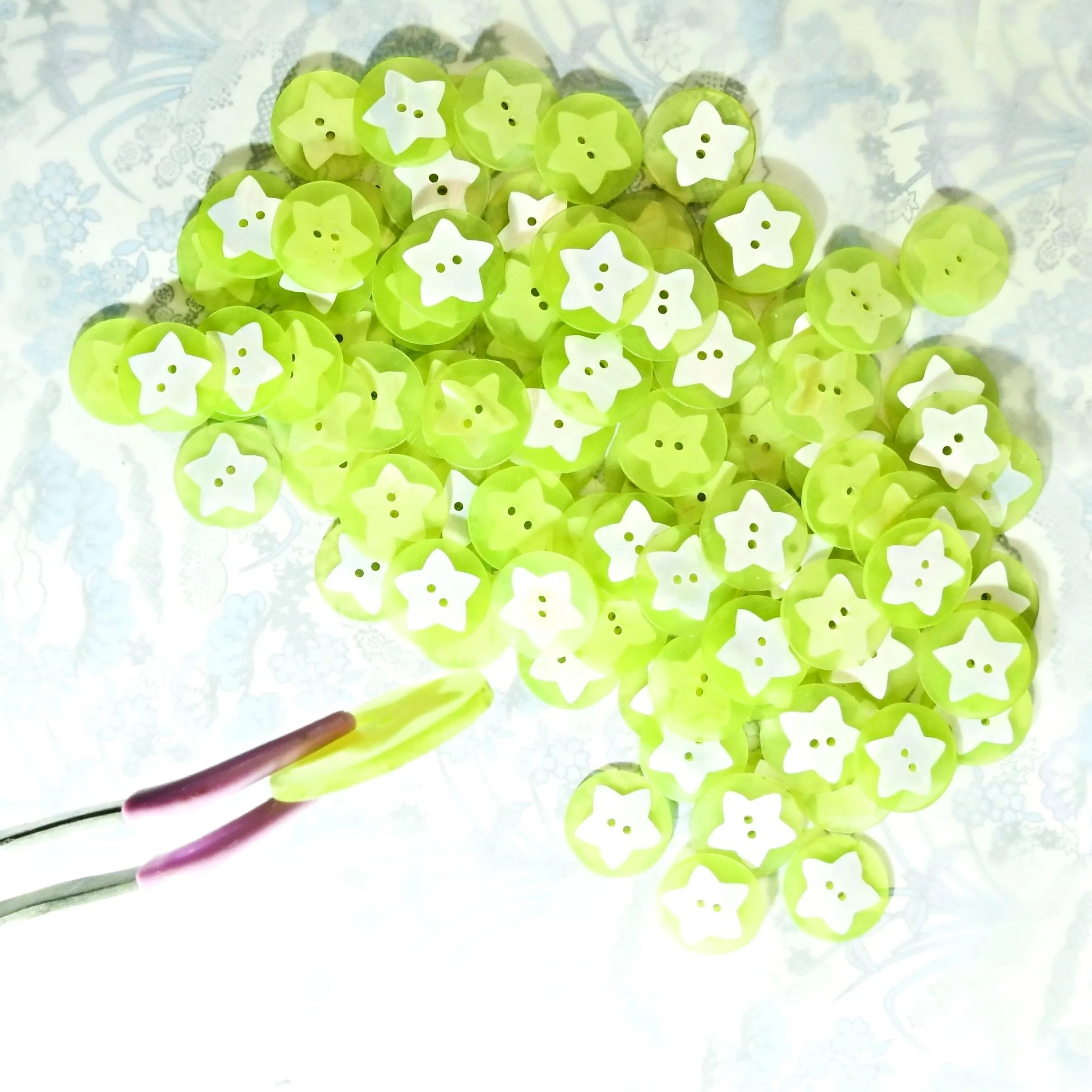 Green beach themed buttons with stars